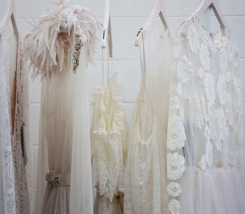Neatly organised closet transitioning from winter to spring.