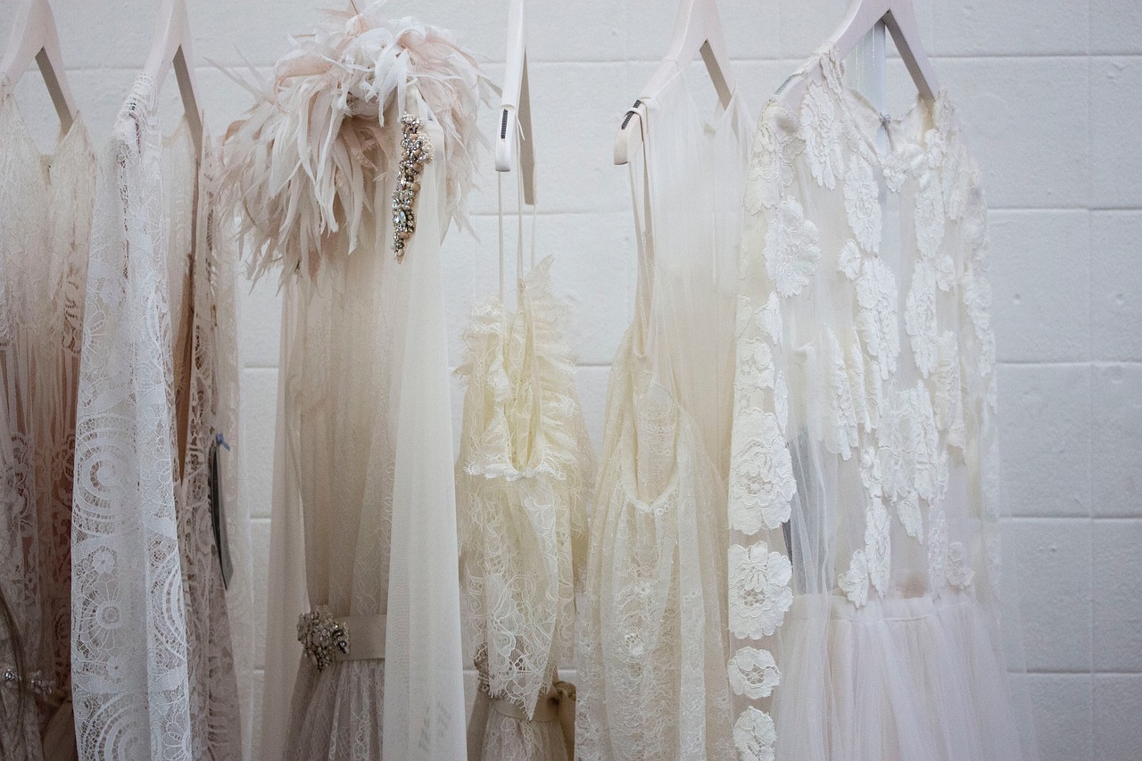 Neatly organised closet transitioning from winter to spring.